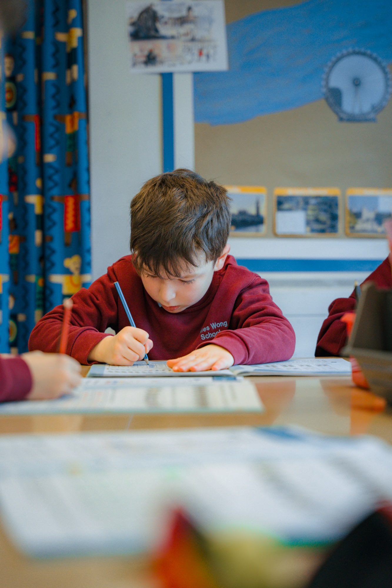 student writing in class