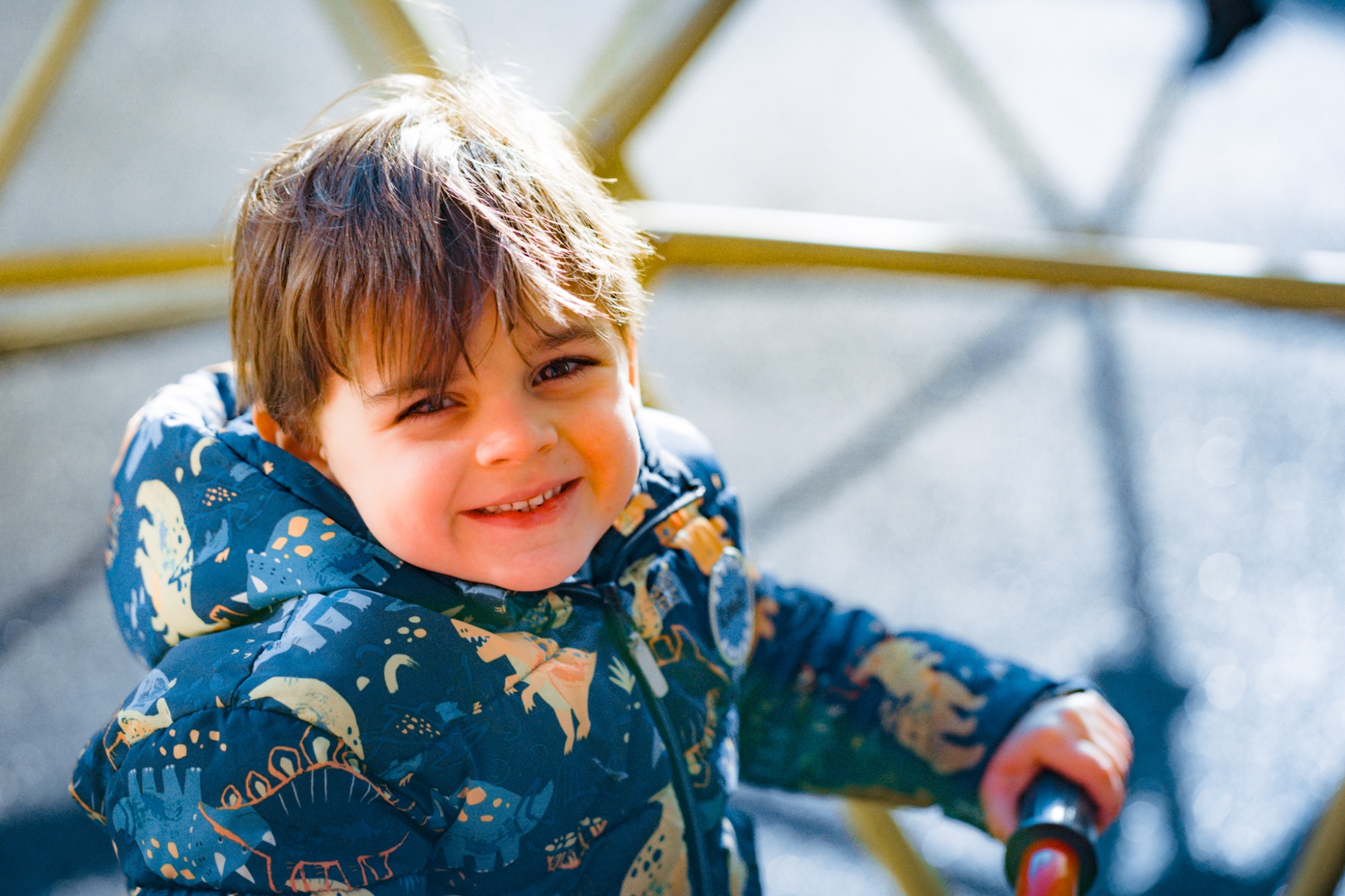 child smiling to camera at break time in playground